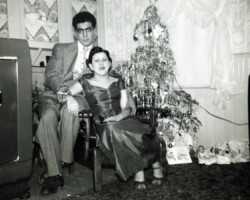 Olivia and Duke in a 1950s Christmas snapshot.
