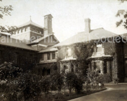 Taunton Jail, Taunton, Massachusetts, showing the garden, 1892. Albumen print, unidentified photographer.   A cross scratched into the original print negative indicates the cell occupied by Lizzie A. Borden.